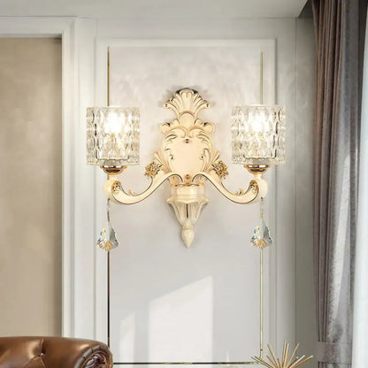 Vintage beige and gold glass wall light with two crystal encrusted glass shades and dangling crystal pendants