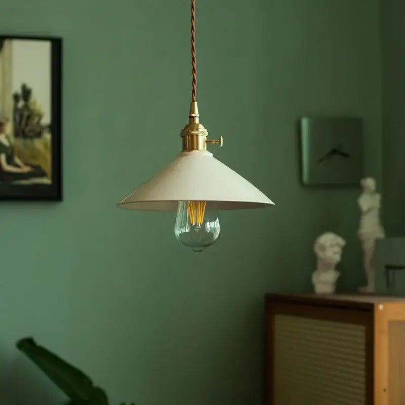 Vintage beige ceramic led pendant lamp with white conical shade and brass fixture featuring exposed edison bulb