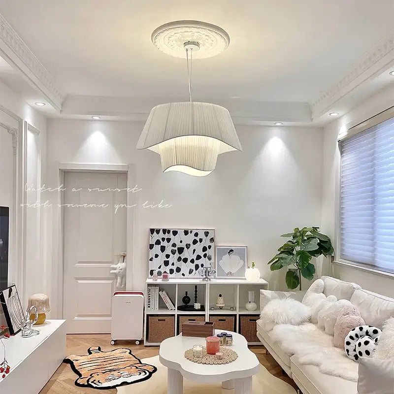 A modern white tiered pendant chandelier with cream wind fabric pleated shade for bedroom decorbites cream wind
