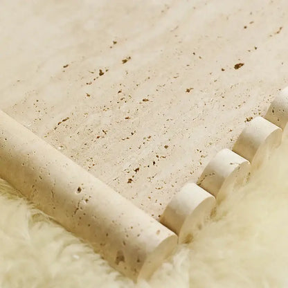 Beige travertine marble serving tray with textured stone tiles and natural speckled finish for kitchen use