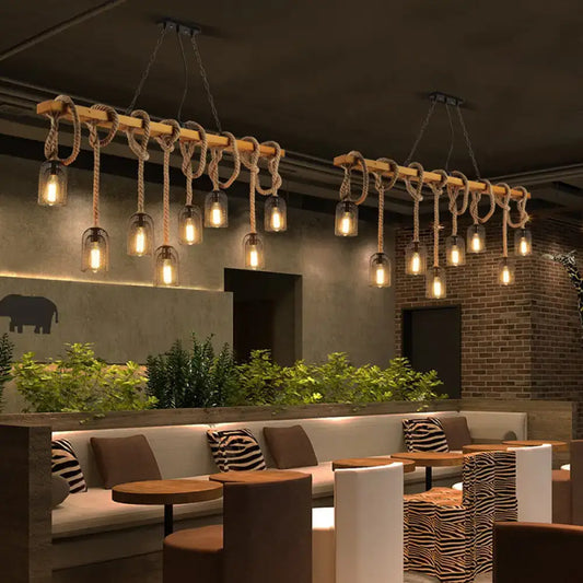 Vintage beige wooden beam chandelier featuring rustic rope knots and glass bulb fixtures ideal for kitchen island lighting