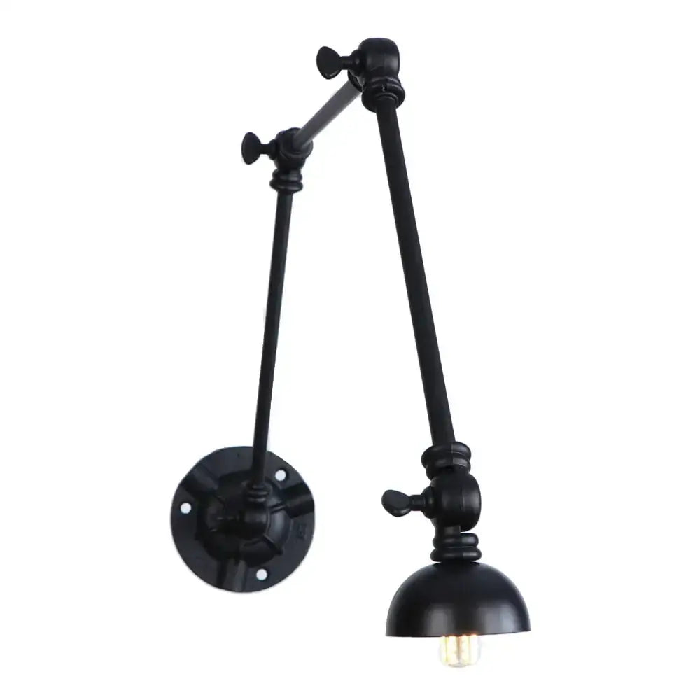 Vintage black adjustable loft wall light with articulated arms and dome-shaped shade for industrial bedroom use