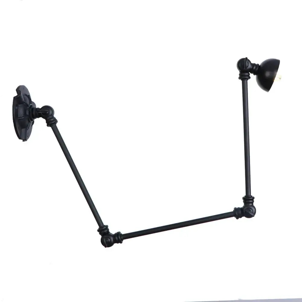 Vintage black adjustable loft wall light with articulated arms and classic bulb head for bedroom use
