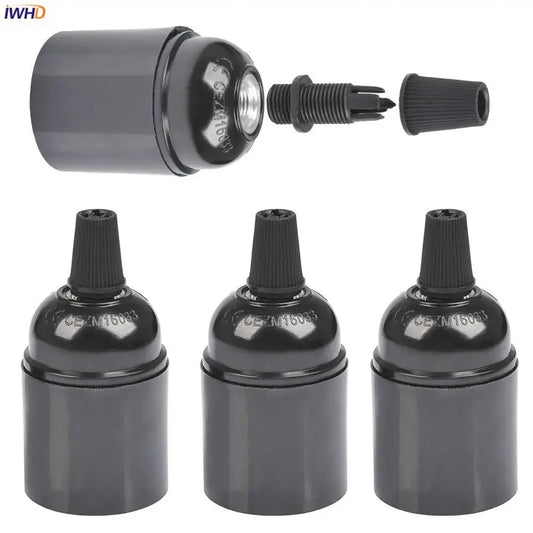 Vintage black e27 socket bulb holder with ribbed black plastic top and threaded metal inserts for kitchen lamp holder
