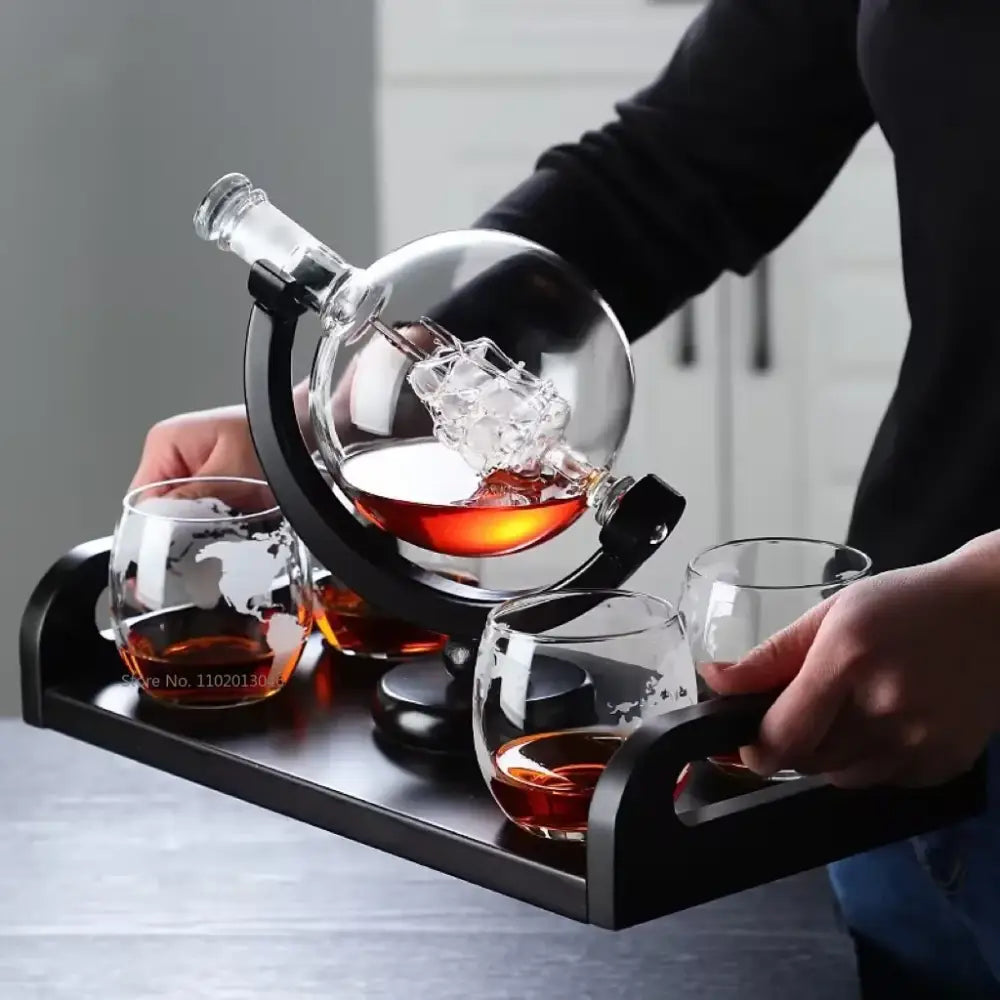 Clear glass vintage black earth decanter set with globe-shaped body and etched world map glasses for dining room use