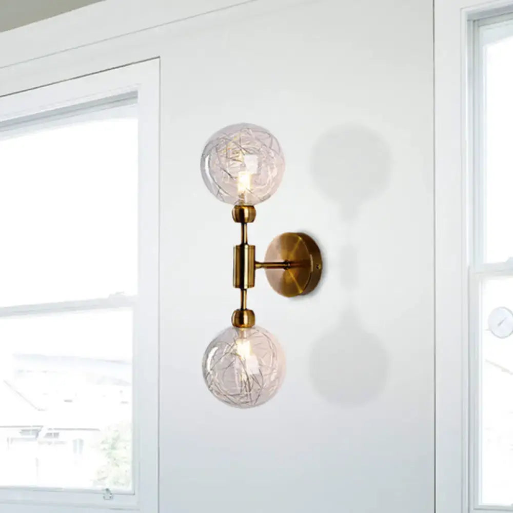 Brass-finished vintage black and gold wall sconce with two clear glass crackled globes for e26 e27 bulbs in bedroom