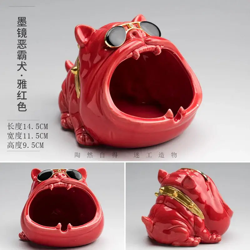 A glossy red decorbites ceramic dog ashtray shaped like a bulldog with sunglasses and a gold collar for decor