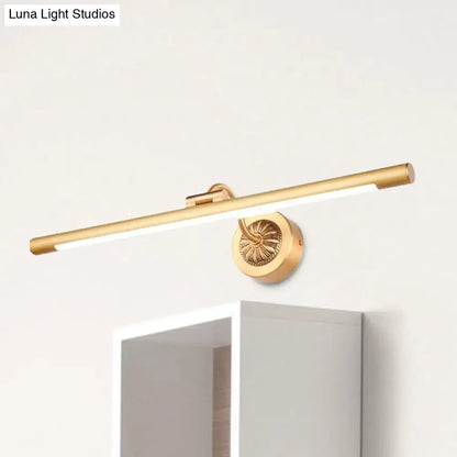Vintage black gold wall light with gold-finished cylindrical design and ornate circular base for bathroom vanity