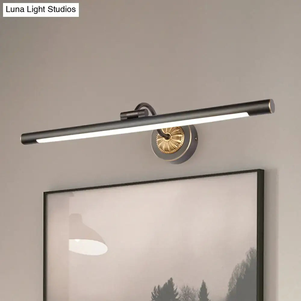 Modern black matte finished led wall light with a black gold finish and decorative circular base for bathroom vanity
