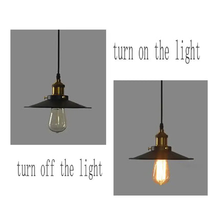 Industrial-style pendant light with black iron finish, brass hardware, and exposed edison bulb for kitchen use