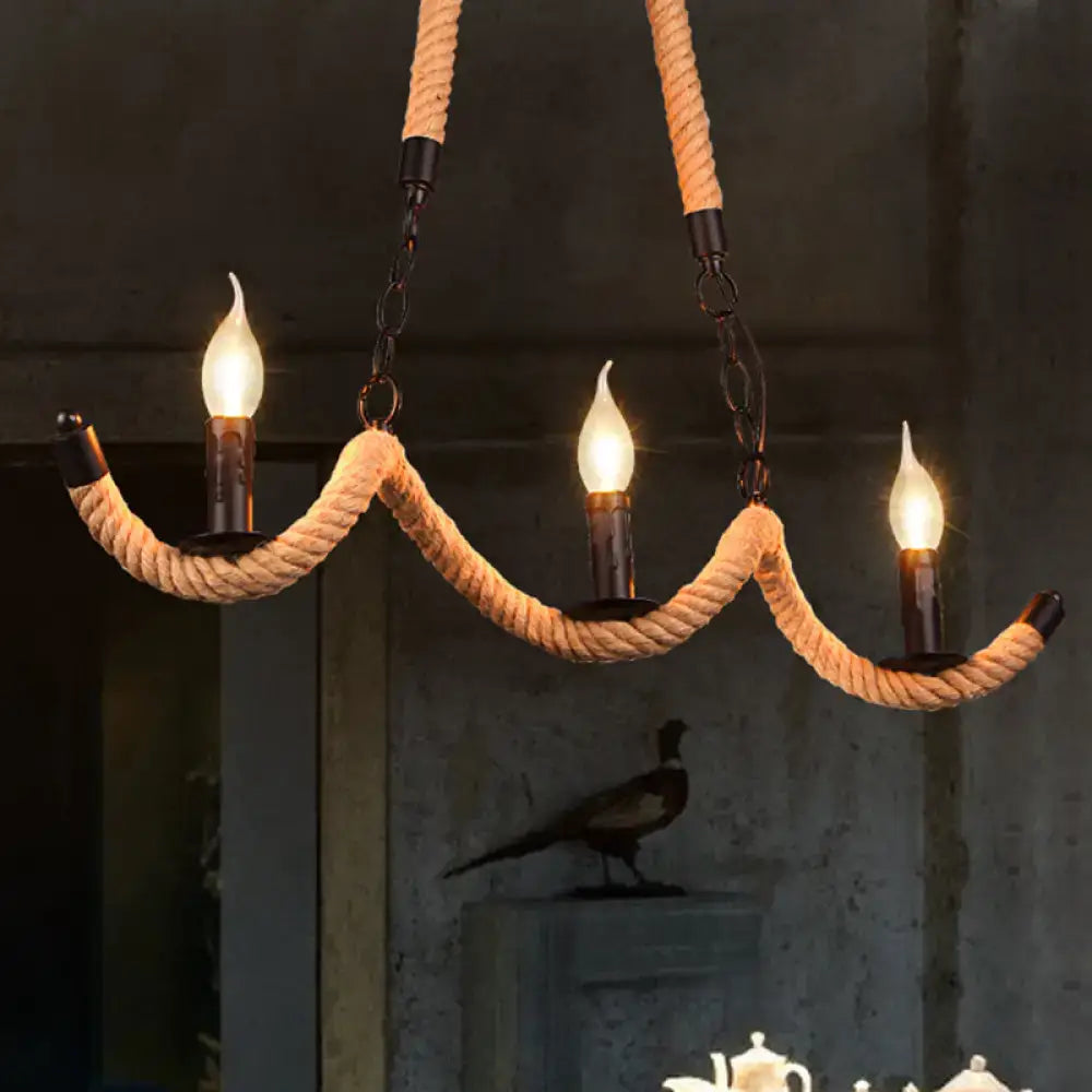 DecorBites™ vintage black rope pendant light with three lit candle-style bulbs for dining room island lighting