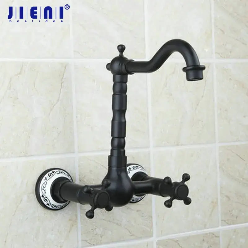 Vintage black swivel wall mounted bathroom faucet with ceramic base and ornate decorbites black swivel detailing