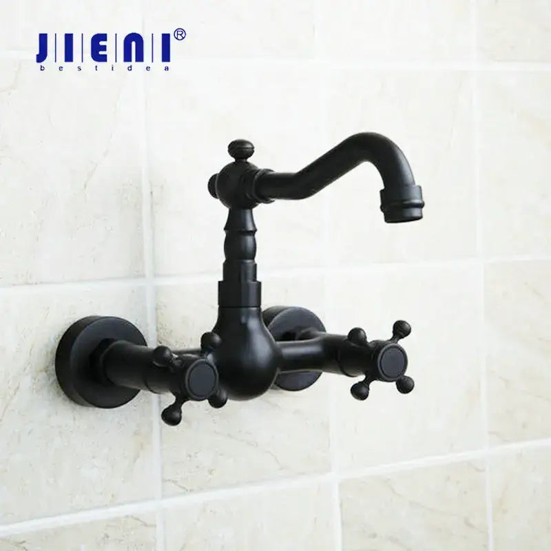 Vintage black swivel wall mounted bathroom faucet with ceramic base featuring black matte finish and two cross-handle knobs