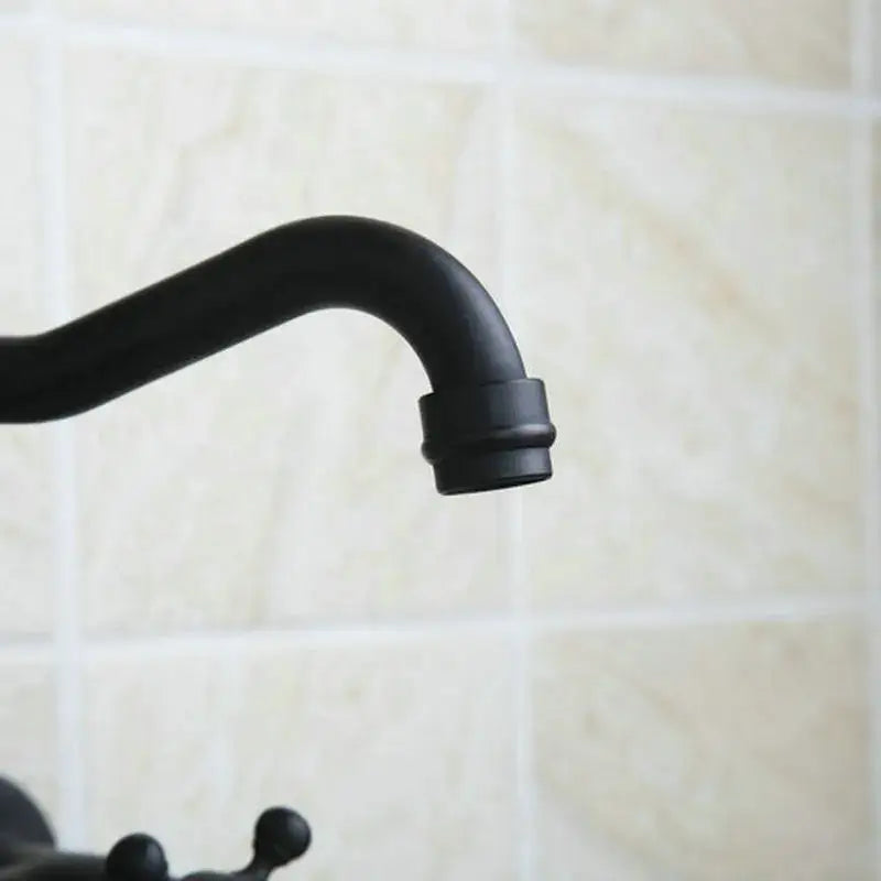 Vintage black swivel wall mounted bathroom faucet with black matte finish ceramic base and curved spout by decorbites black swivel