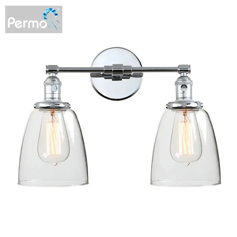 Chrome-finished vintage wall sconce with two clear glass shades and exposed filament bulbs for bedroom lighting