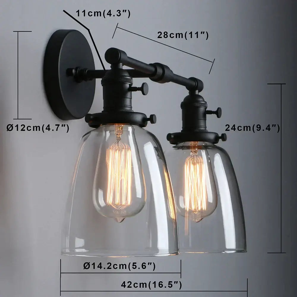 Vintage black two light wall sconce with clear glass domes and filament bulbs for bedroom vintage wall lighting