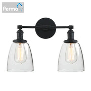 Vintage black two light wall sconce with clear glass shades and exposed filament bulbs for bedroom lighting