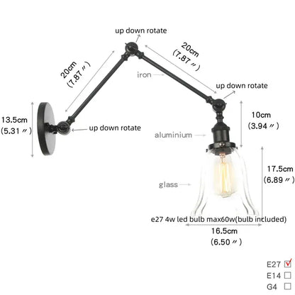 Black vintage wall lamp with adjustable iron and aluminum arms and clear glass shade housing exposed Edison bulb