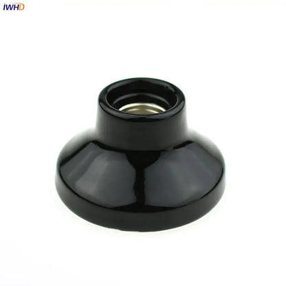 Vintage black and white ceramic lamp holder base with glossy finish and metallic threaded interior for bedroom socket