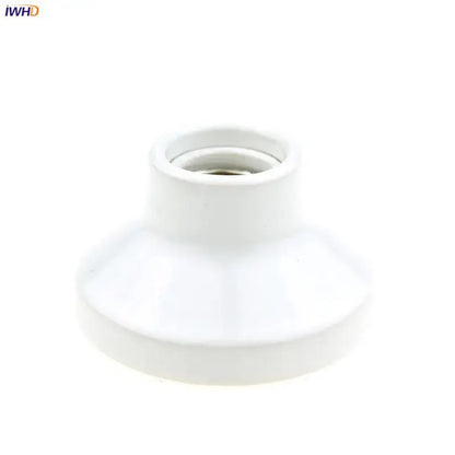 White ceramic lamp holder base with smooth glossy finish and flared base for vintage black and white bedroom socket