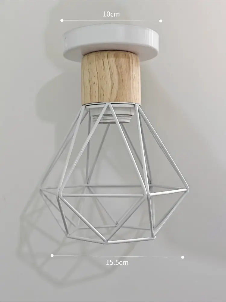 Vintage black iron cage pendant light with wood accent and white base for dining room lighting in square meters