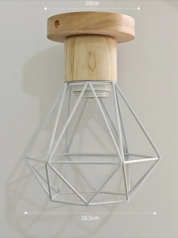 Minimalist pendant light with natural wood base and white iron cage perfect for dining room under 30 square meters