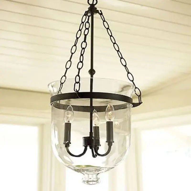 Vintage black wrought iron pendant lamp with clear glass and three candle-style bulbs for dining room decorbites black vintage
