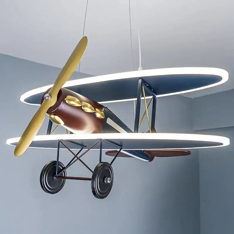 Vintage blue and brown iron aircraft pendant light with illuminated wings and gold accents for boys bedroom decorbites iron aircraft
