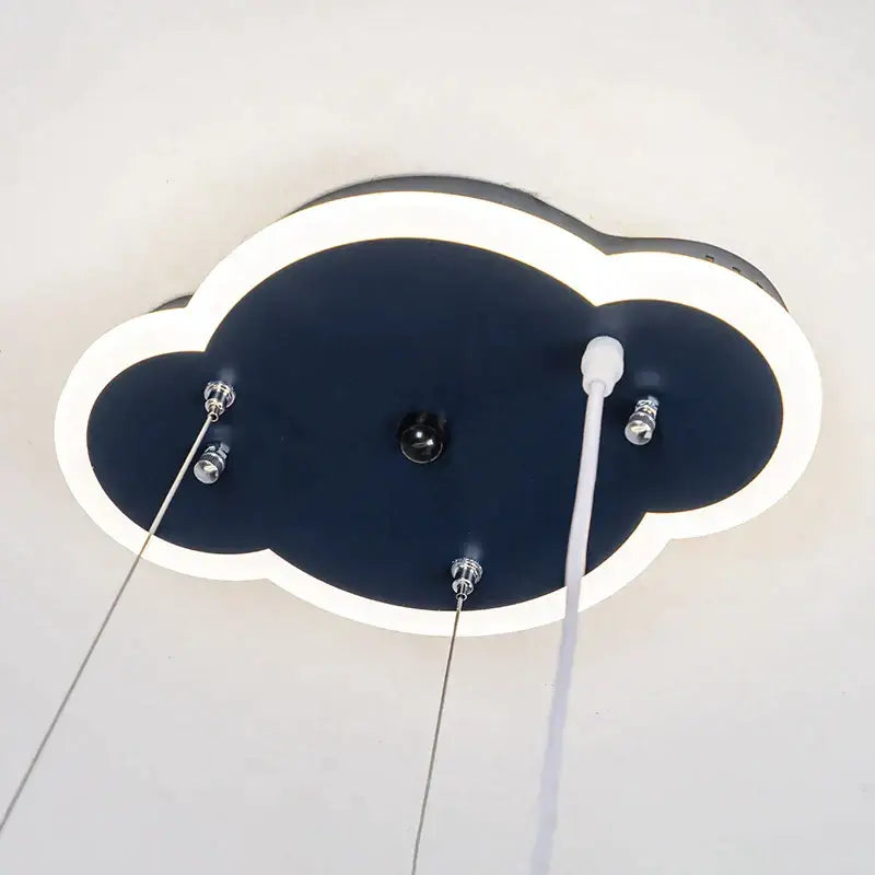 A modern cloud-shaped pendant light with navy blue body and glowing white led trim for boys bedroom decorbites iron aircraft