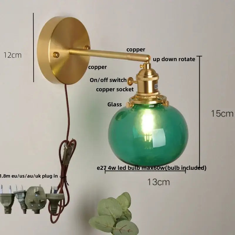 Brass-finished copper wall lamp with a green glass globe for decorbites blue glass vintage bedroom sconce lighting