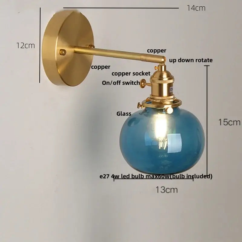 Vintage blue glass wall lamp with brass-finished copper sconce and spherical blue glass shade for bedroom decorbites blue glass