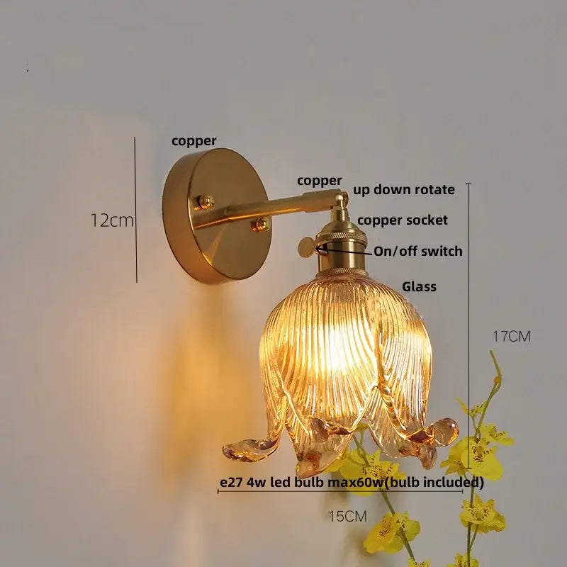 Copper-finished wall lamp with ribbed amber glass shade shaped like open flower for decorbites blue glass collection