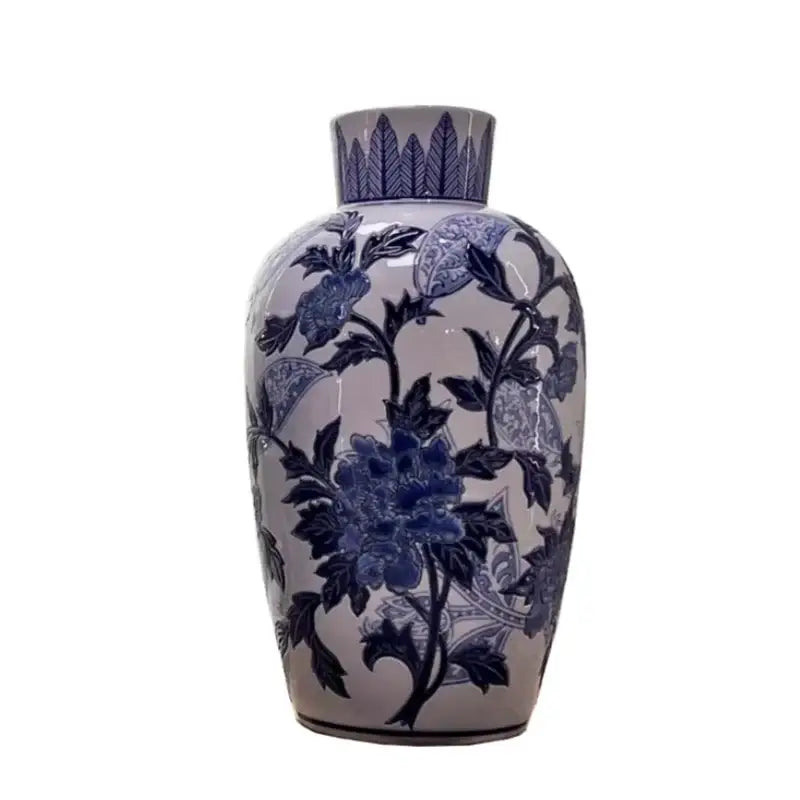 Vintage blue and white porcelain ceramic vase with intricate peony floral patterns and feathered rim for home decor
