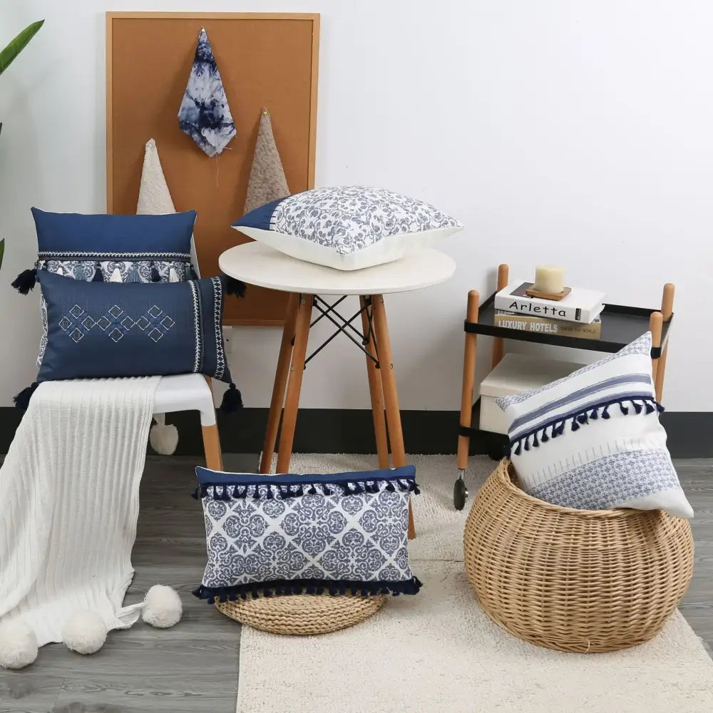 Vintage blue and white pillow cover with tassel trim ideal for living room decor featuring decorbites blue tassel design