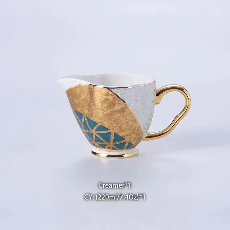 Elegant vintage bone china milk jug with gold trim and teal geometric design featuring ornate golden handle decorbites bone china