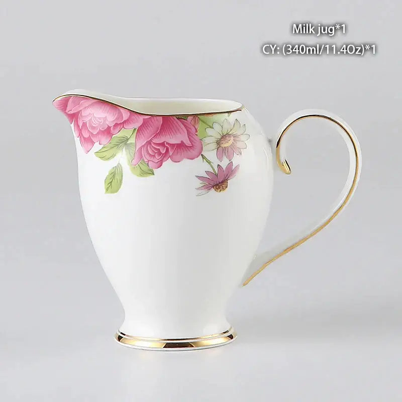 Vintage bone china milk jug with delicate pink and green floral design and gold trim by decorbites bone china