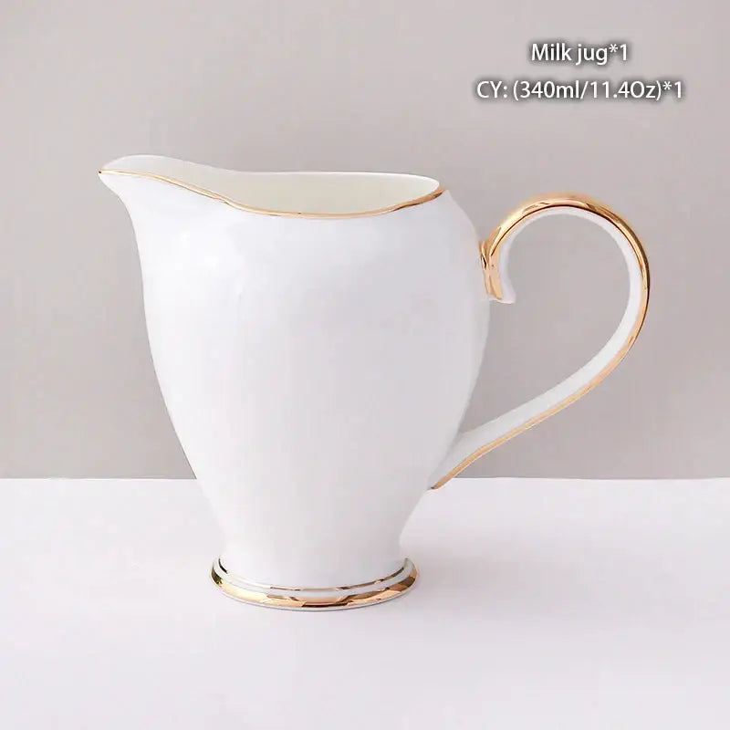 Vintage bone china milk jug with elegant gold trim in white ceramic by Decorbites for dining room creamer use