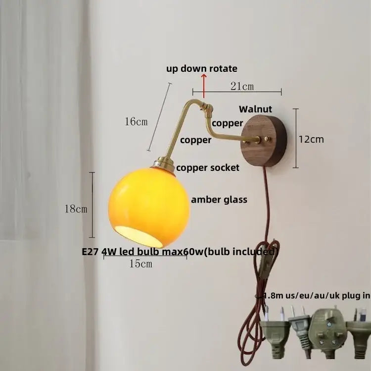 Vintage brass amber glass led wall lights pull feature warm amber globe lamp with copper arm and walnut wall plate