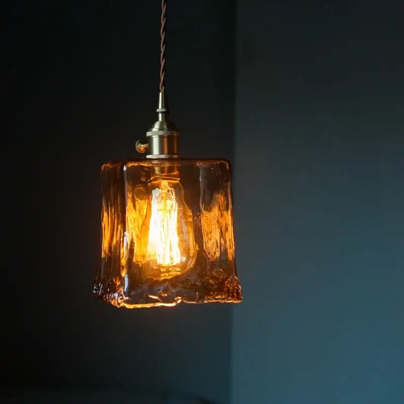 Vintage brass amber glass pendant light with textured amber glass, brass finish, and twisted cord for kitchen island decorbites brass amber