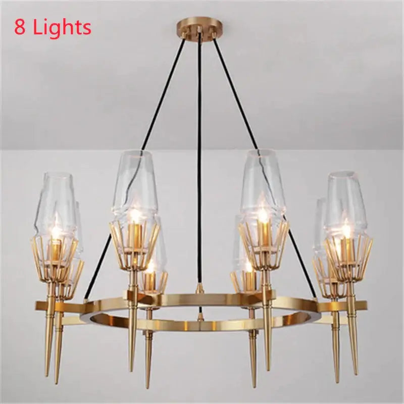 Vintage brass ana chandelier with gold-toned metalwork and eight clear glass shades by decorbites brass ana