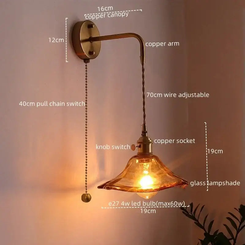 Vintage brass and amber glass copper led wall sconce with adjustable copper arm and warm amber lampshade for bedroom lighting