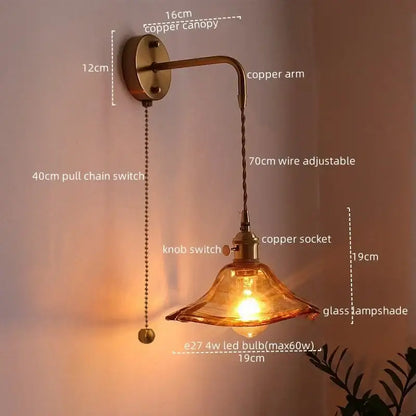 Vintage brass and amber glass copper led wall sconce with adjustable copper arm and warm amber lampshade for bedroom lighting