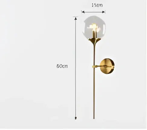 Vintage brass led wall lamp with gold-toned stem and clear glass globe for stylish bedroom sconce lighting