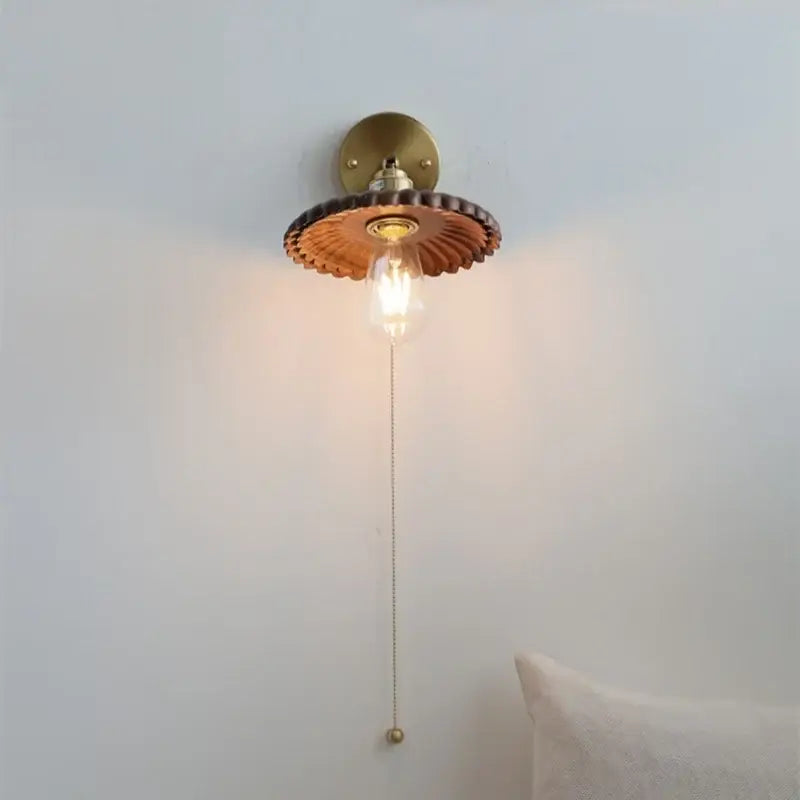 Vintage brass and amber glass wall lamp with scalloped shade and exposed bulb perfect for decorbites led walnut wood decor