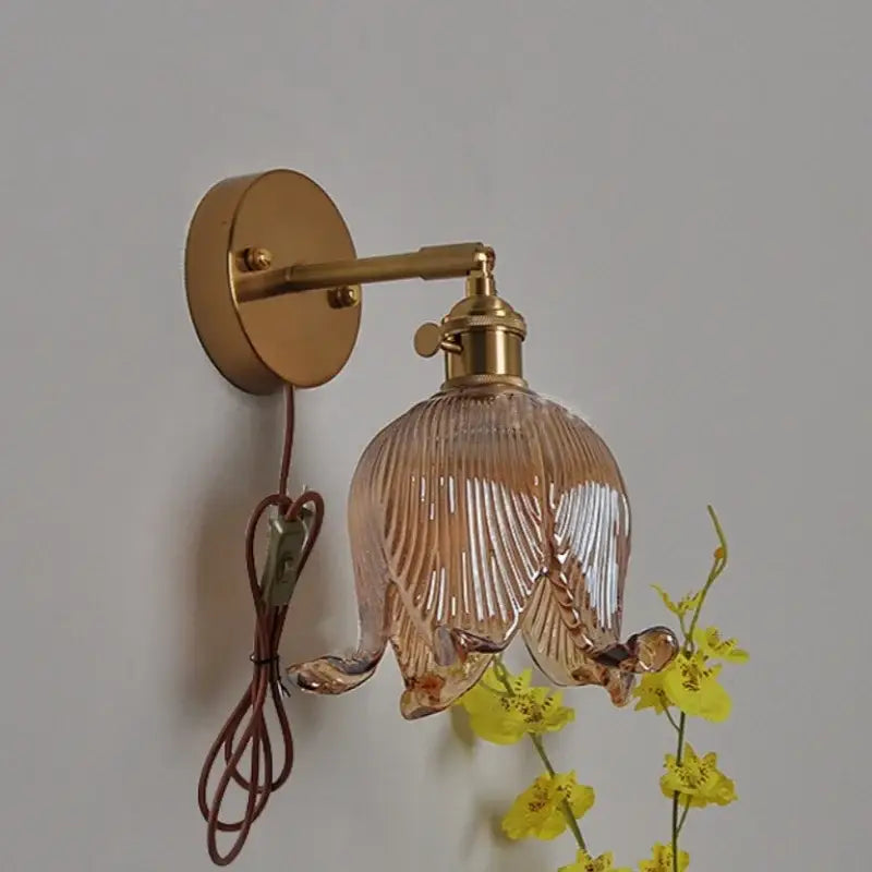 Vintage brass wall light with loft amber glass ribbed shade shaped like an open flower for bedroom decorbites loft amber