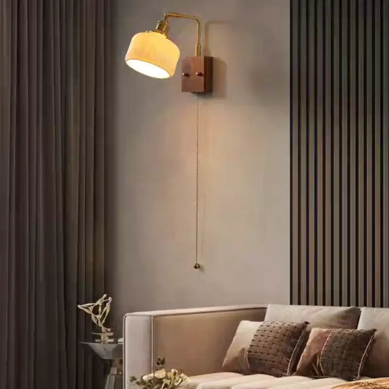 Brass-finished wall sconce with cream fabric shade and wooden base for vintage decorbites ceramic led wall lighting