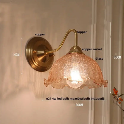 Vintage brass and amber glass wall sconce with textured amber glass shade and ruffled edges for bedroom vanity decorbites amber glass