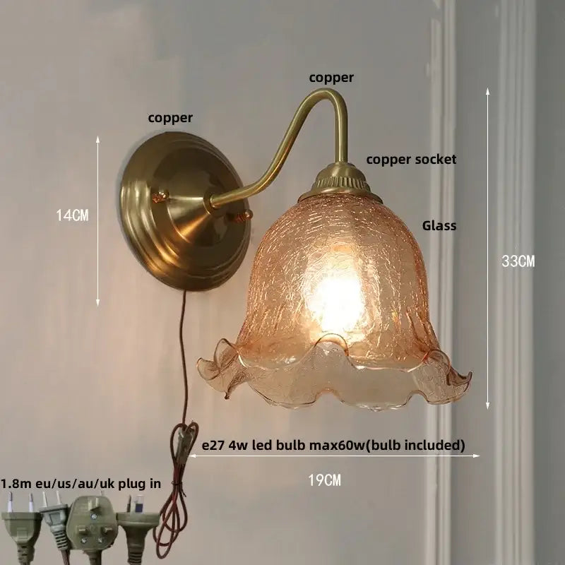 Vintage brass wall sconce with decorbites amber glass shade featuring textured ruffled edges for bedroom vanity light
