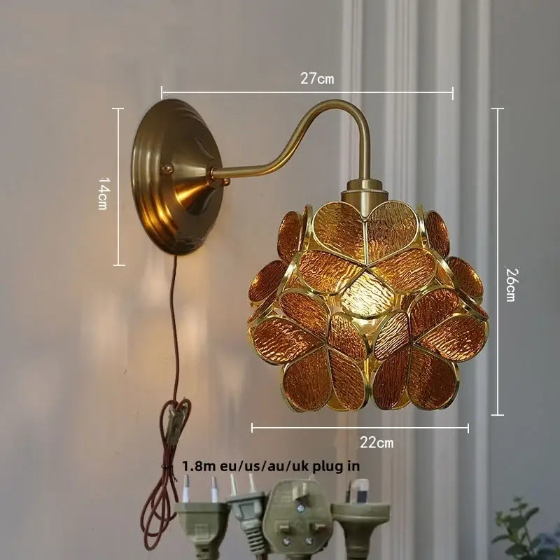 Vintage brass wall sconce with floral decorbites amber glass shade for bedroom vanity lighting