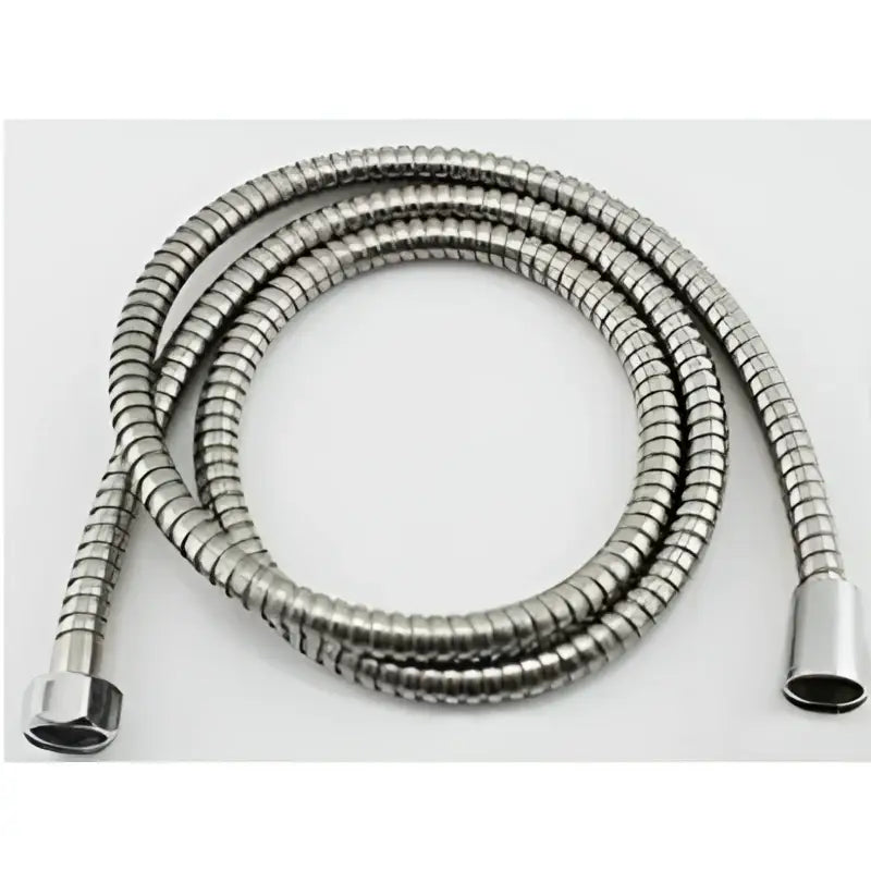 A coiled metallic silver shower hose with flexible corrugated design and threaded ends for vintage brass hand shower head faucet set